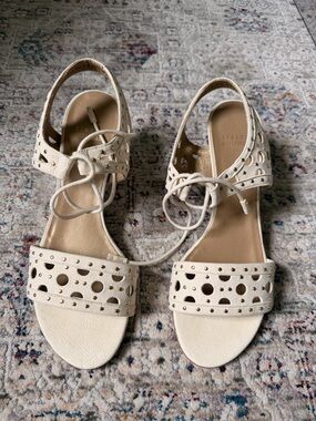 Stuart Weitzman Cream Perforated Lace-Up Sandals with Gold Studs